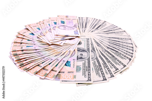 Banknotes of Ukraine and the USA in denominations of five hundred hryvnia and one hundred dollars photo