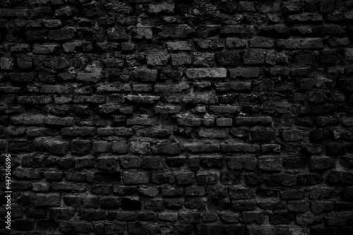 Old black brick wall background