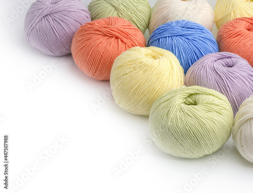 Colorful yarn balls isolated on white