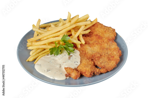 Schnitzel with sauce and fries, restaurant dish, image isolate