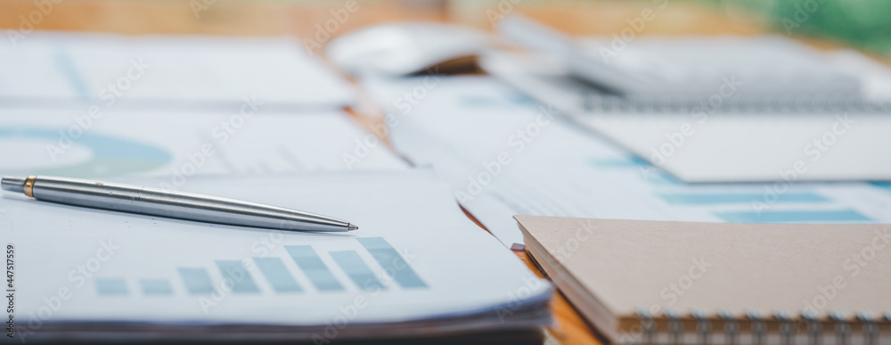 Close up of Businesswoman hands hold documents with financial statistic stock photo,discussion and analysis data the charts and graphs. report Finance concept Close up of Businesswoman hands hold documents with financial statistic stock photo,discussion and analysis data the charts and graphs. report Finance concept