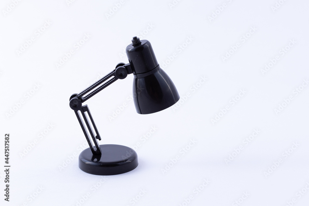 Table Lamp Mini Model. Small Black Desk Lamp on White Background Table Lamp Mini Model. Small Black Desk Lamp on White Background