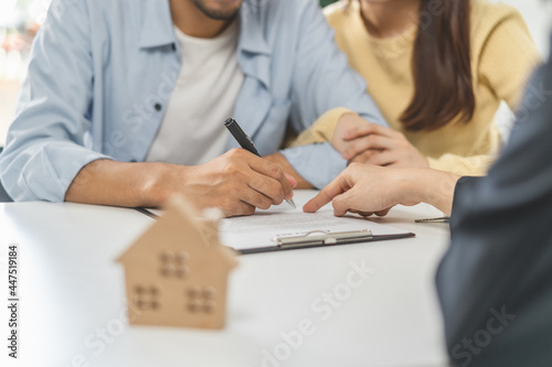 Happy asian couple client  tenant buyer home  apartment  sign signature contract rental  purchase. Landlord  realtor agreement after bank approve mortgage  loan success or done. Property agent concept