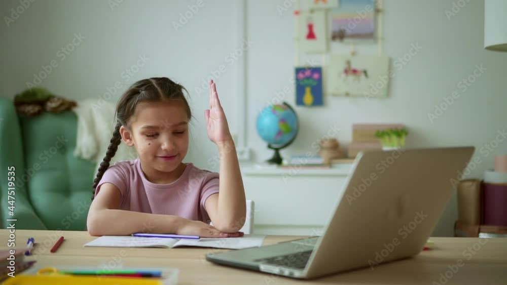 Online education at home girl raises hand to answer question Spbd Online education at home girl raises hand to answer question Spbd
