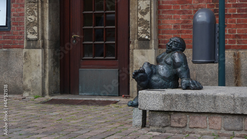 statue of a fat person sitting on the garden terrace, Kiel, Germany