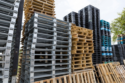 Different types of pallets are stacked in a row , Can be used as a background