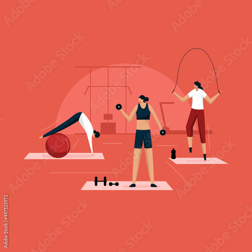 Young girls and women exercising in fitness club or gym