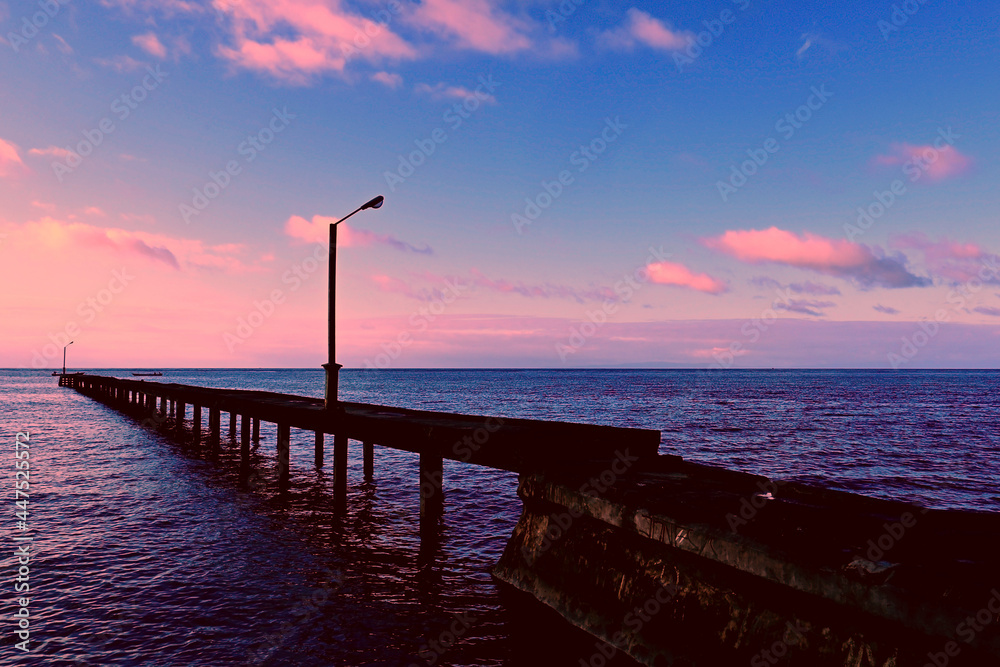 boat mooring harbor bridge decorated with beautiful sunset
