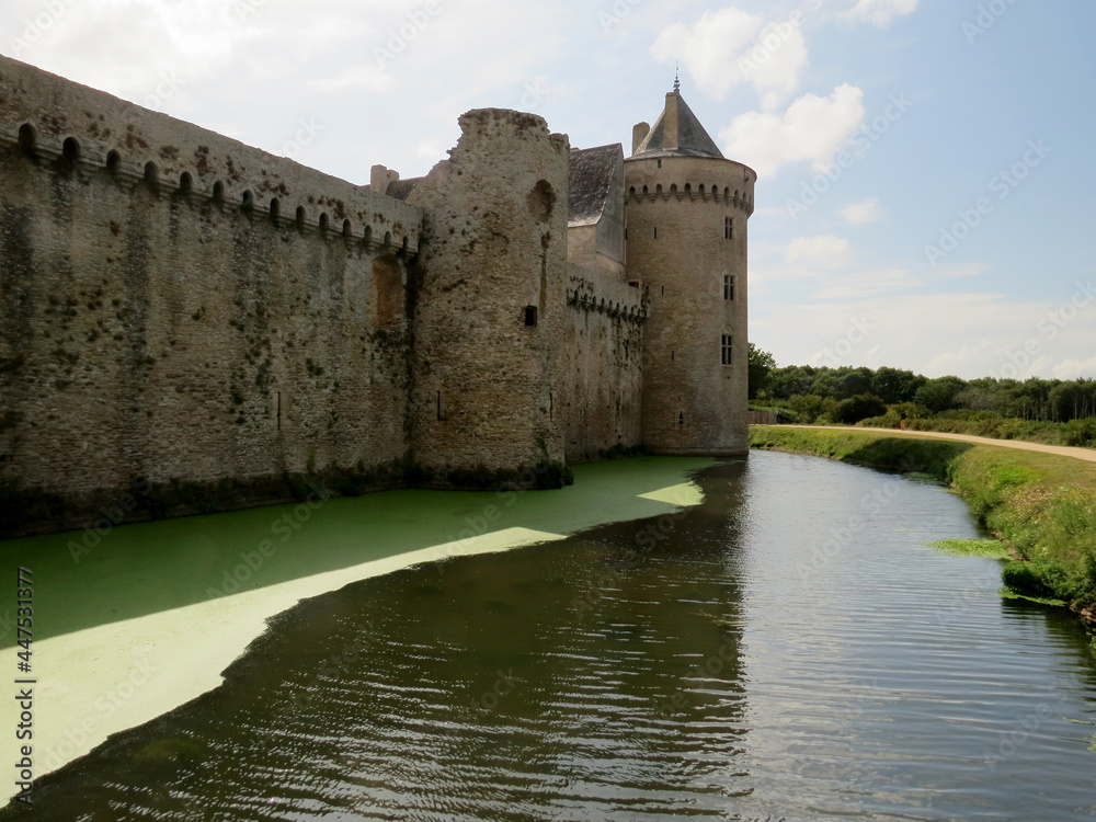 Exterior views of the castle of Suscinio: towers and moat, in Sarzeau in Morbihan, next to the Atlantic Ocean, in Brittany, France