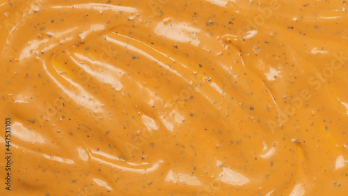 Whipped delicious sauce texture. Hamburger sauce background.