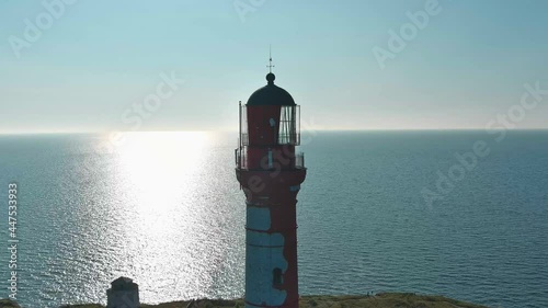 Flying around the lighthouse of Pakri with sea background 