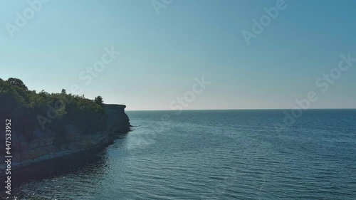 Along the rocky cliff towards the sea