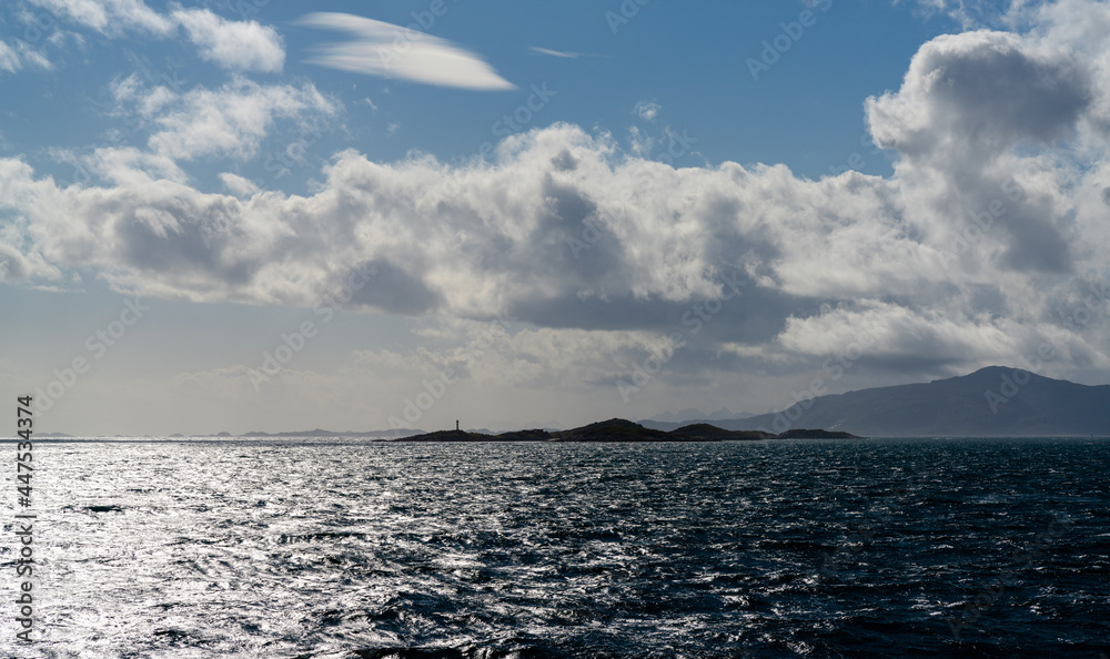 ocean view with Hjertholmen Island and the Lofoten Islands of northern Norway ocean view with Hjertholmen Island and the Lofoten Islands of northern Norway