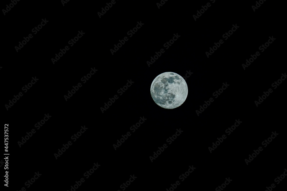 Closeup of full moon. Shining Moon closeup in black background. Soft focus Closeup of full moon. Shining Moon closeup in black background. Soft focus