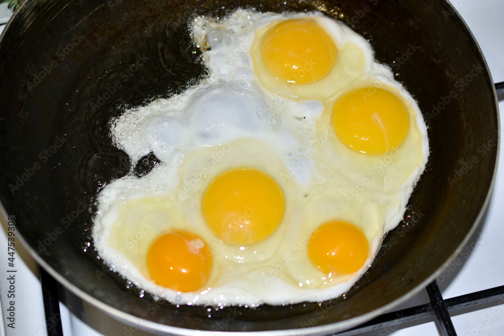 Frying fried eggs in a frying pan Frying fried eggs in a frying pan