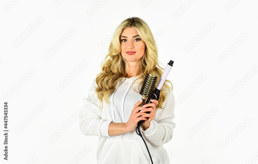 Useful Curling Iron Tricks Everyone Should Know. Create hairstyle with curling iron. Woman with long curly hair use curling iron. Hairdresser tips. Girl adorable blonde. Buy tools. Online shop