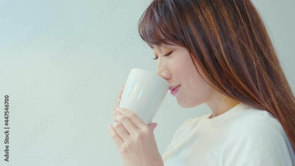 Portrait of young beautiful woman having a cup of coffee Portrait of young beautiful woman having a cup of coffee