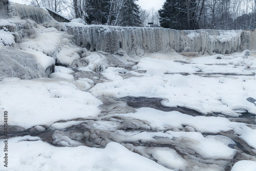 Fototapeta premium Frozen Keila-Joa waterfall by winter. Harjumaa, Estonia