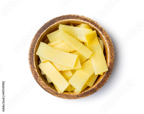 Fotografie Sliced canned bamboo shoots in wooden bowl.