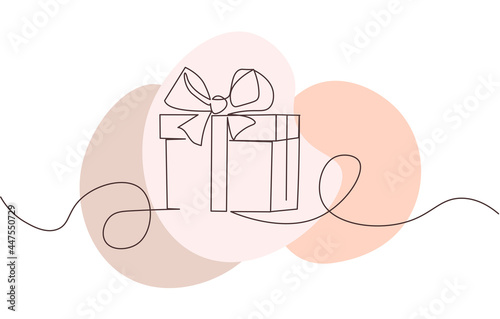 Continuous line drawing of gift box with bow on white background. Wrapped surprise package for christmas or birthday party .Party and celebration. Flat cartoon line art outline vector illustration photo