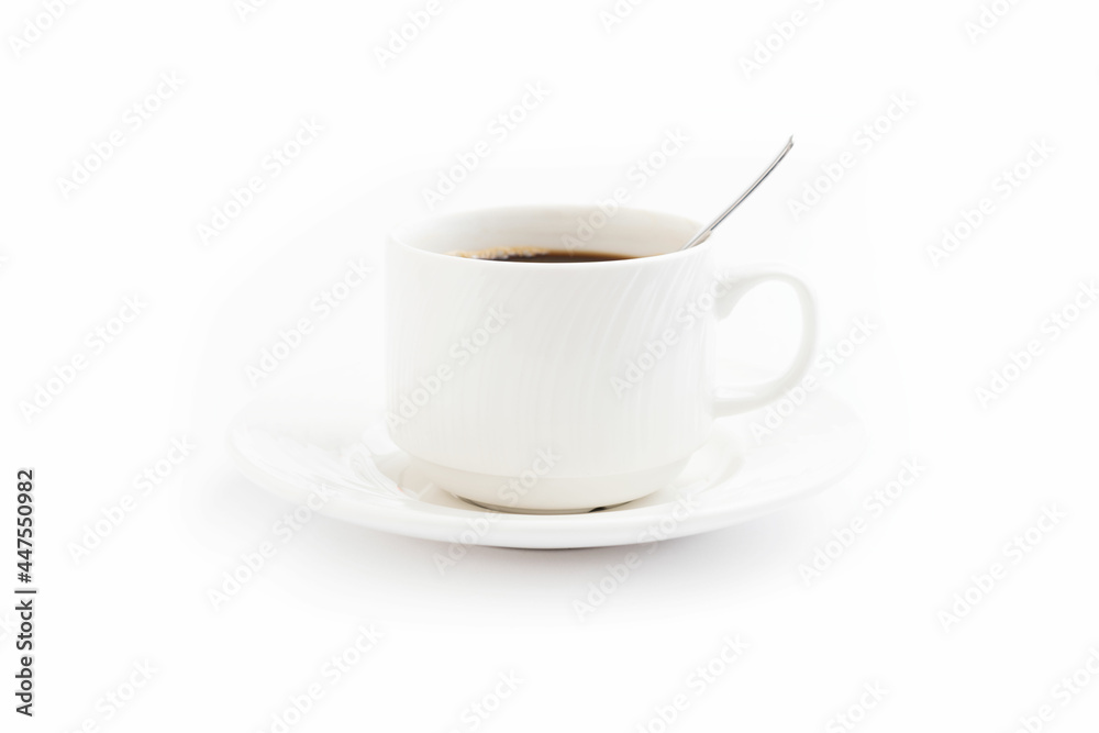 White coffee mug with spoon isolated on white background White coffee mug with spoon isolated on white background