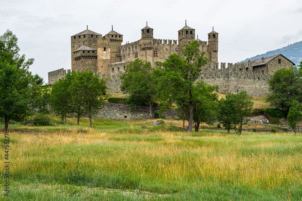 View of Fenis Castle, a famous medieval Castle in Aosta Valley and one of the major tourist attractions of the region