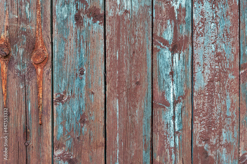 Vintage wooden background. Old grungy colorful wood background. Old weathered wooden plank
