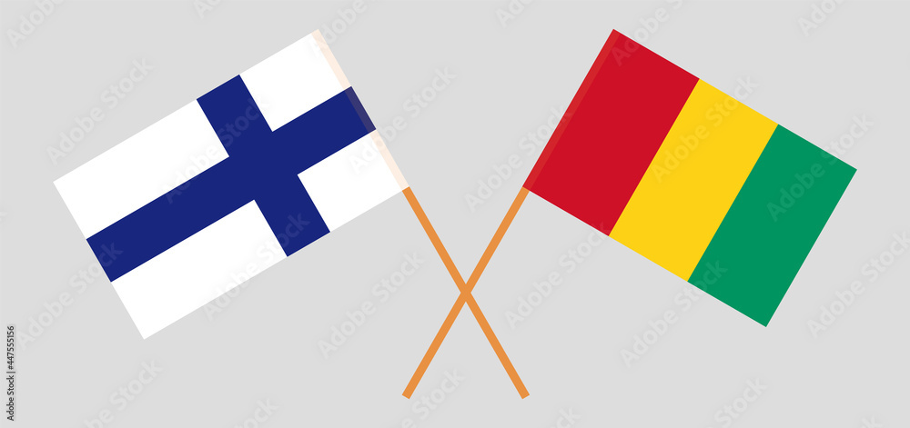 Crossed flags of Finland and Guinea. Official colors. Correct proportion