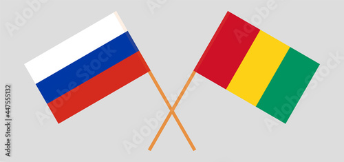 Crossed flags of Russia and Guinea. Official colors. Correct proportion