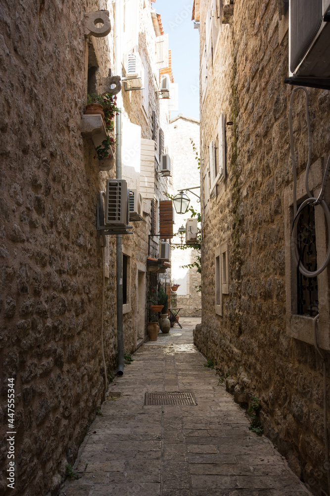 Narrow street in the Old Town in Budva, Montenegro.