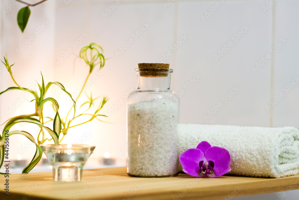Spa-beauty salon, wellness center. Spa treatment aromatherapy for a woman's body in the bathroom with candles, oils and salt.