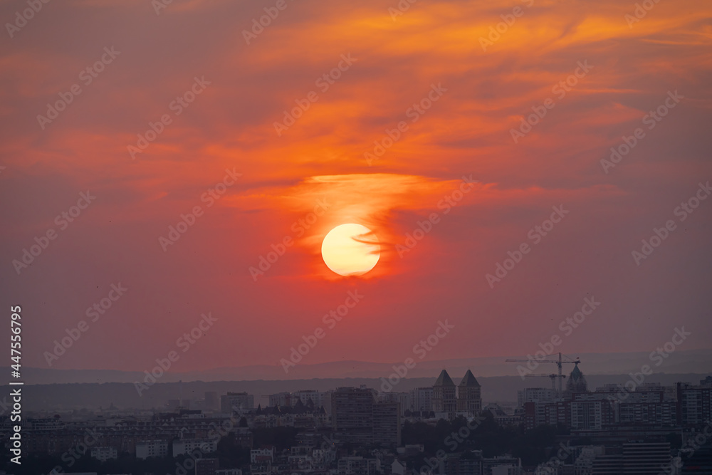 Paris, France - 07 22 2021: Eiffel Tower: Sunset over Paris and La Defense