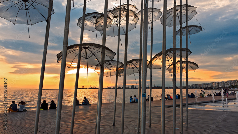 The Umbrellas, by Giorgios Zogolopoulos located at the seafront and constructed in 1997.  He was Greek sculptor which works adorn public places and official buildings. Thessaloniki, Greece, Jun 2014