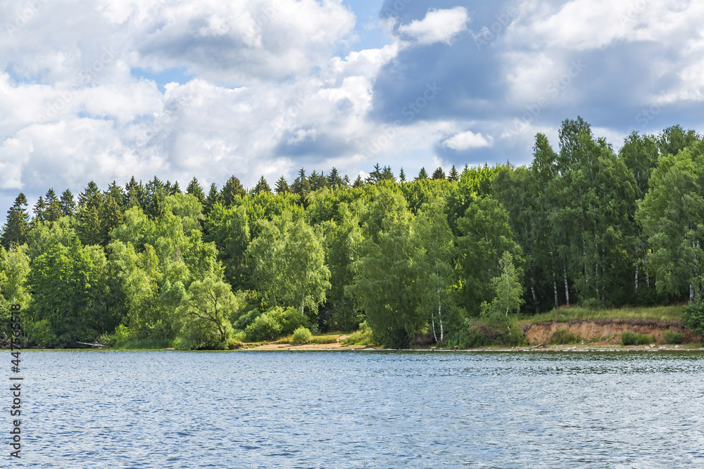 Beautiful natural summer landscape with picturesque lake Senezh and cloudy sky. Moscow region, Russia Beautiful natural summer landscape with picturesque lake Senezh and cloudy sky. Moscow region, Russia