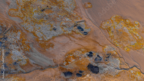 Hverir geothermal mud springs in Iceland close to lake Myvatn. Aerial view of sulphur fumes and bubbling lakes of mud.