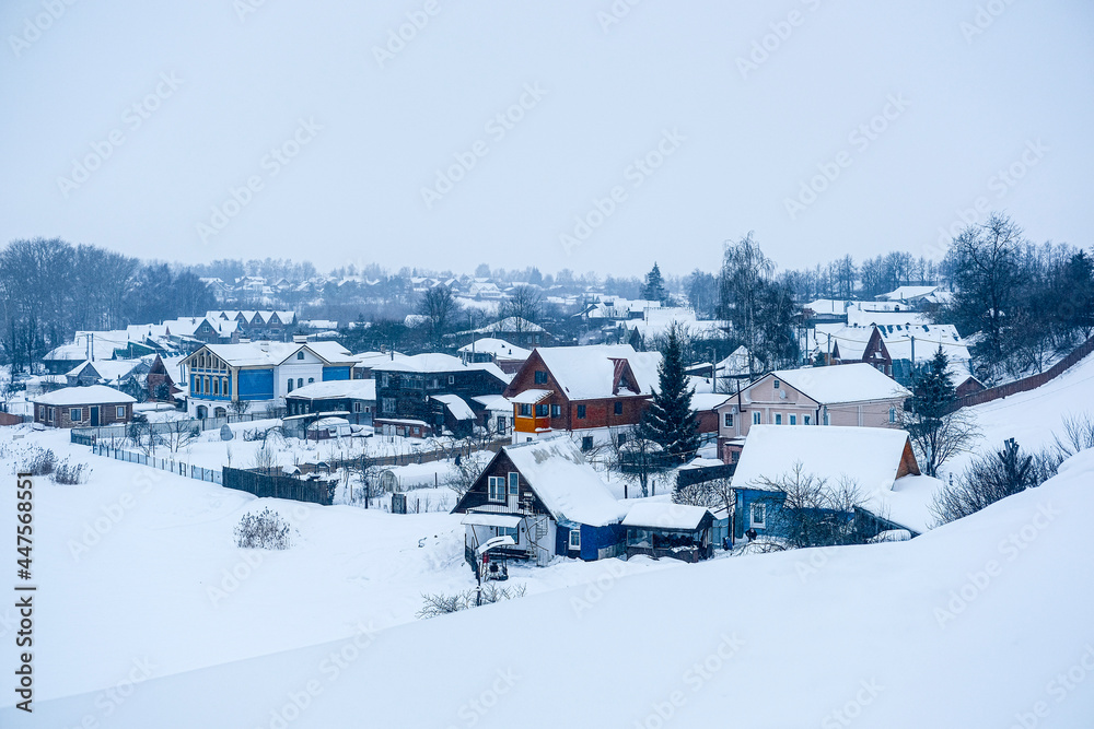 Winter landscape with the image of  old russian town Suzdal
