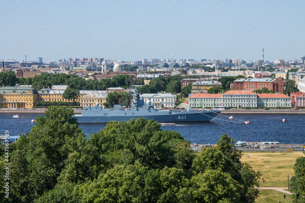 panoramic top view of the Neva River, historical buildings of the city center and a warship on a sunny summer day and a copy space in Saint-Petersburg Russia