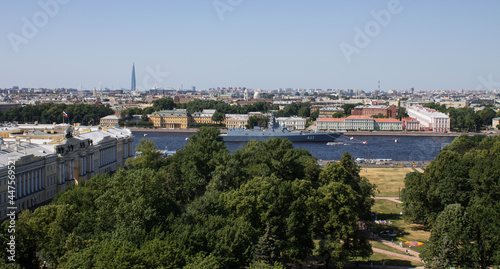 panoramic top view of the Neva River, historical buildings and the Lakhta skyscraper against the blue sky on a sunny day in Saint-Petersburg Russia