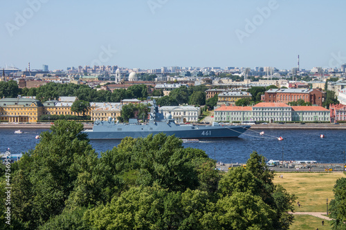 panoramic top view of the Neva River, historical buildings of the city center and a warship on a sunny summer day and a copy space in Saint-Petersburg Russia