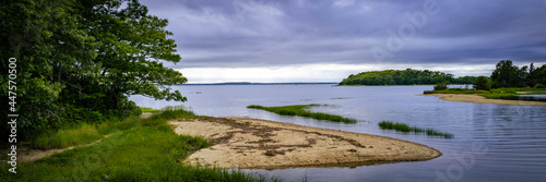 Seascape over Monk Park beach and Islands under dramatic clouds on Cape Cod