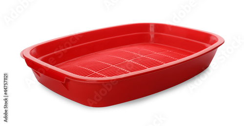 Empty red cat litter tray isolated on white photo