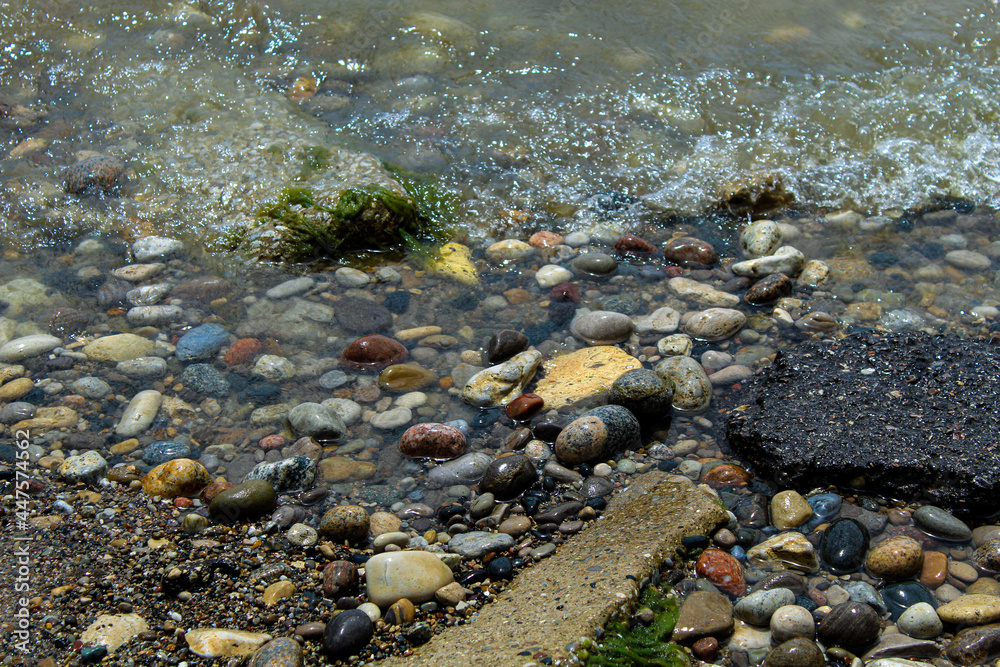 Water washing over pebbles