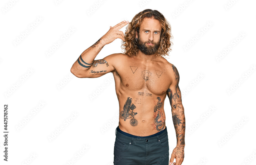 Handsome man with beard and long hair standing shirtless showing tattoos  shooting and killing oneself pointing hand and fingers to head like gun,  suicide gesture. Stock Photo | Adobe Stock
