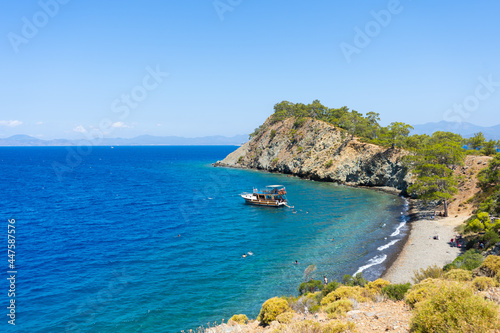 Fototapeta Naklejka Na Ścianę i Meble -  Picturesque landscape of the peninsula beach, view from the mountain road. Fethiye, Mugla province, Turkey.