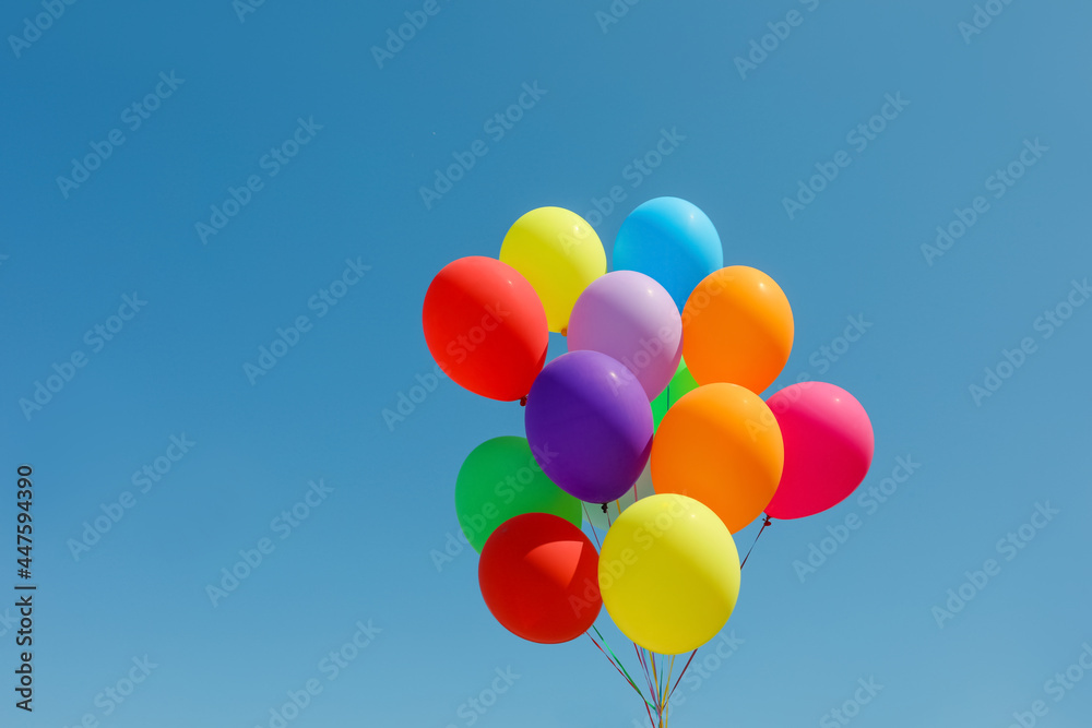 Bunch of colorful balloons against blue sky Bunch of colorful balloons against blue sky
