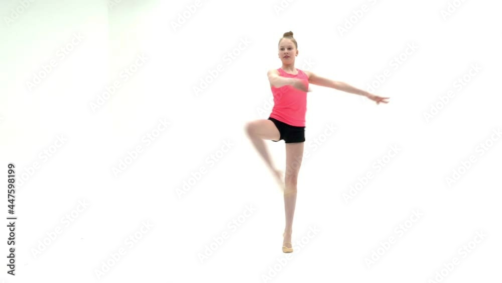 The gymnast perform an acrobatic element on the floor. The gymnast perform an acrobatic element on the floor.