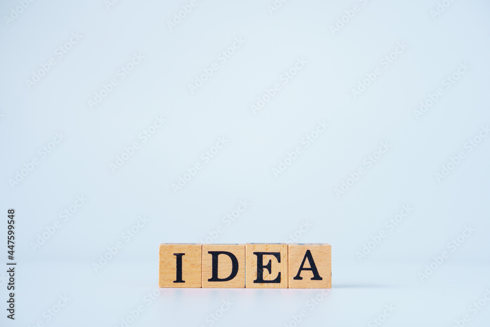 IDEA Word written on wooden cubes and a white background. IDEA Word written on wooden cubes and a white background.