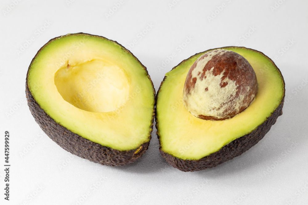 Ripe avocado isolated on white background.