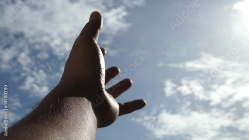 Hand of happy sunset. happy silhouette at sky and sunset. hand sun close-up silhouette sunlight dream of happiness