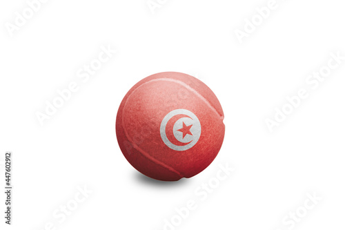 Tennis ball with the coloured national flag of  Tunisia on the white background	